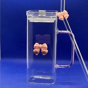 Clear Glass with Pink Bow Accents and straw